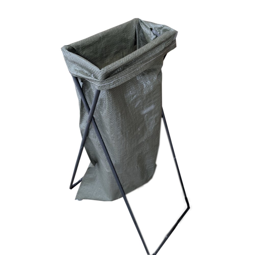A sandbag held open on the stand